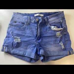 Women’s Medium Wash Ripped Jean Shorts